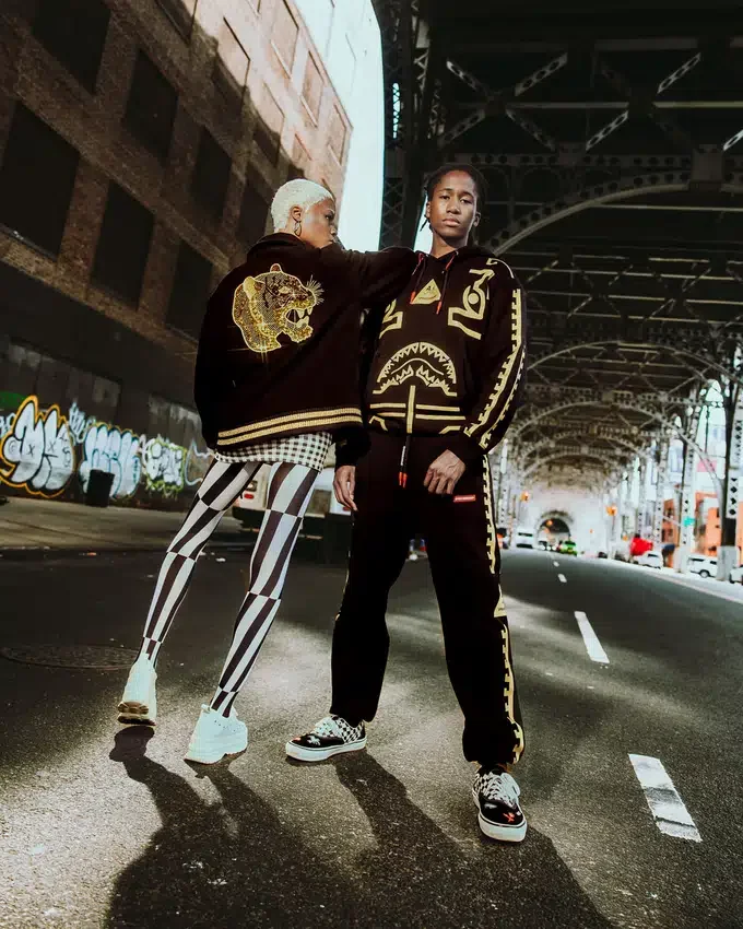 A.I.9 AFRICAN INTELLIGENCE GUILDED LEOPARD – SANDFLOWER COLLAB VARSITY-JACKE