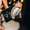 A.I. AFRICAN INTELLIGENCE SHARKS OF THE GOLD OCEAN CROSSOVER CLUTCH – SANDFLOWER-KOLLABORATION