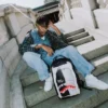 BAG ON BAG OPTICAL ILLUSION SHARKS IN PARIS RUCKSACK