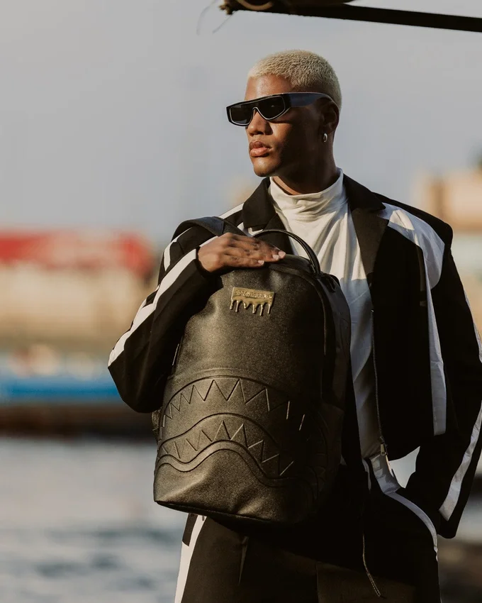 GOLD BRICK DRIP SCHWARZER RUCKSACK
